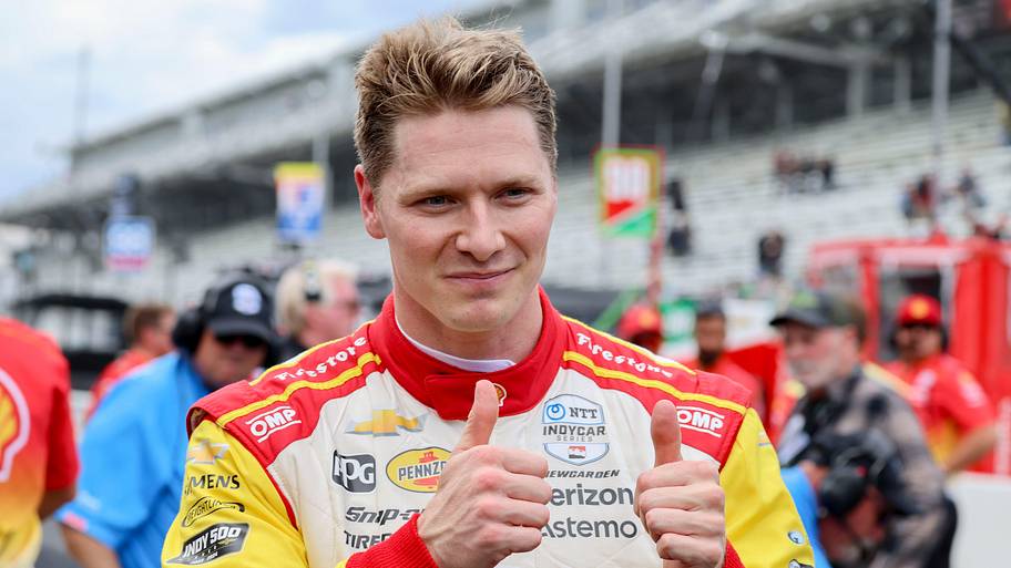 Team Penske driver Josef Newgarden gives a thumbs up after winning the Pit Stop Challenge ahead of the Indianapolis 500.