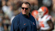 Oct 4, 2025; West Lafayette, Indiana, USA; Illinois Fighting Illini head coach Bret Bielema watches warm ups before the game against the Purdue Boilermakers at Ross-Ade Stadium. Mandatory Credit: Marc Lebryk-Imagn Images