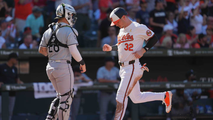 Baltimore Orioles first baseman Ryan O’Hearn (32) scores on a hit by outfielder Austin Slater (not shown) during the third inning against the Chicago White Sox at Oriole Park at Camden Yards on Sept 2.