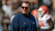 Oct 4, 2025; West Lafayette, Indiana, USA; Illinois Fighting Illini head coach Bret Bielema watches warm ups before the game against the Purdue Boilermakers at Ross-Ade Stadium. Mandatory Credit: Marc Lebryk-Imagn Images