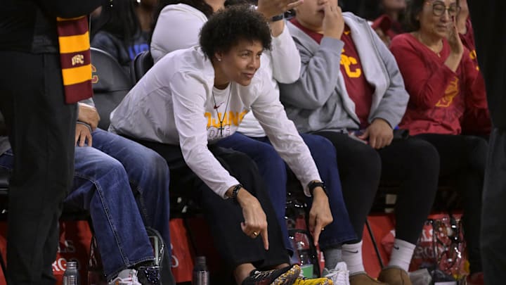 Jan 14, 2024; Los Angeles, California, USA; Cheryl Miller, left, former basketball player, olympian and NBA sideline reporter attends the game between the USC Trojans and the UCLA Bruins at Galen Center. Mandatory Credit: Jayne Kamin-Oncea-Imagn Images