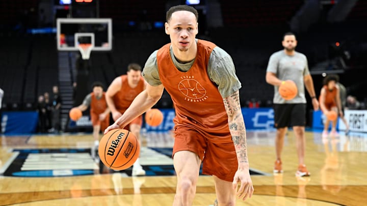 Mar 18, 2026; Portland, OR, USA; Texas Longhorns guard Chendall Weaver (2) dribbles the ball during a practice session ahead of the first round of the men's 2026 NCAA Tournament.