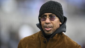 Stephen A. Smith , American sports television personality, walks on the field before the game between the Baltimore Ravens and the Pittsburgh Steelers at M&T Bank Stadium. 