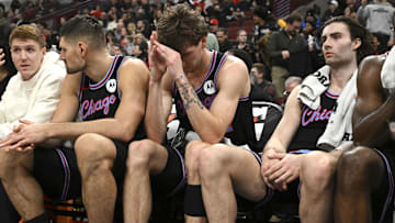 Dec 3, 2025; Chicago, Illinois, USA;  Chicago Bulls forward Matas Buzelis (14), center, and guard Josh Giddey (3) after the second half against the Brooklyn Nets at the United Center. Mandatory Credit: Matt Marton-Imagn Images