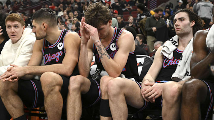 Dec 3, 2025; Chicago, Illinois, USA;  Chicago Bulls forward Matas Buzelis (14), center, and guard Josh Giddey (3) after the second half against the Brooklyn Nets at the United Center. Mandatory Credit: Matt Marton-Imagn Images