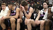 Dec 3, 2025; Chicago, Illinois, USA;  Chicago Bulls forward Matas Buzelis (14), center, and guard Josh Giddey (3) after the second half against the Brooklyn Nets at the United Center. Mandatory Credit: Matt Marton-Imagn Images