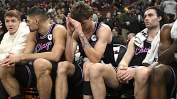 Dec 3, 2025; Chicago, Illinois, USA;  Chicago Bulls forward Matas Buzelis (14), center, and guard Josh Giddey (3) after the second half against the Brooklyn Nets at the United Center. Mandatory Credit: Matt Marton-Imagn Images