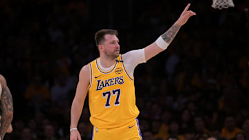Feb 10, 2025; Los Angeles, California, USA; Los Angeles Lakers guard Luka Doncic (77) reacts after a basket against the Utah Jazz at Crypto.com Arena. Mandatory Credit: Jayne Kamin-Oncea-Imagn Images