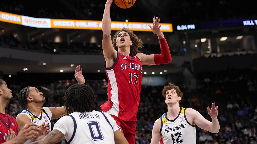 Feb 18, 2026; Milwaukee, Wisconsin, USA;  St. John’s Red Storm forward Ruben Prey (17) shoots during the first half against the Marquette Golden Eagles at Fiserv Forum.
