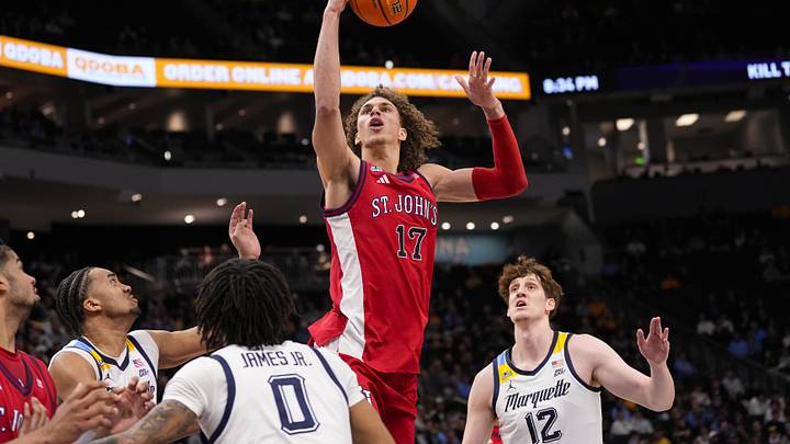 Feb 18, 2026; Milwaukee, Wisconsin, USA;  St. John’s Red Storm forward Ruben Prey (17) shoots during the first half against the Marquette Golden Eagles at Fiserv Forum.