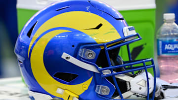 Nov 17, 2024; Foxborough, Massachusetts, USA; A Los Angeles Rams helmet sits on a cooler during the second half against the New England Patriots at Gillette Stadium. Mandatory Credit: Eric Canha-Imagn Images
