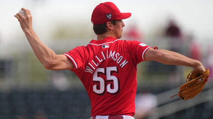 Cincinnati Reds starting pitcher Brandon Williamson (55) delivers a pitch in the third inning during a MLB spring training baseball game, Sunday, Feb. 25, 2024, at Goodyear Ballpark in Goodyear, Ariz.