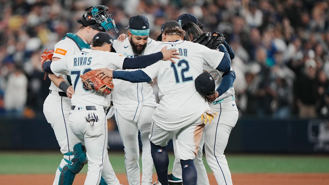 Oct 17, 2025; Seattle, Washington, USA; The Seattle Mariners celebrate after defeating the Toronto Blue Jays in game five of the ALCS round for the 2025 MLB playoffs at T-Mobile Park. Mandatory Credit: Stephen Brashear-Imagn Images