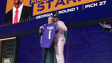 Apr 24, 2025; Green Bay, WI, USA; NFL commissioner Roger Goodell with Georgia Bulldogs safety Malaki Starks after he is selected by the Baltimore Ravens as the number 27 pick in the first round of the 2025 NFL Draft at Lambeau Field. Mandatory Credit: Kirby Lee-Imagn Images