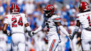 Sep 7, 2024; Lexington, Kentucky, USA; South Carolina Gamecocks defensive back O'Donnell Fortune (3) fives defensive back Jalon Kilgore (24) and defensive back DQ Smith (1) during the first quarter against the Kentucky Wildcats at Kroger Field. Mandatory Credit: Jordan Prather-Imagn Images