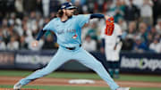 Oct 17, 2025; Seattle, Washington, USA; Toronto Blue Jays pitcher Kevin Gausman (34) throws a pitch against the Seattle Mariners in the first inning during game five of the ALCS round for the 2025 MLB playoffs at T-Mobile Park. Mandatory Credit: Stephen Brashear-Imagn Images