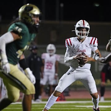 Millard South Jett Thomalla (4) looks for receivers against Basha during a game at Basha High School in Chandler on Aug. 30, 2024.