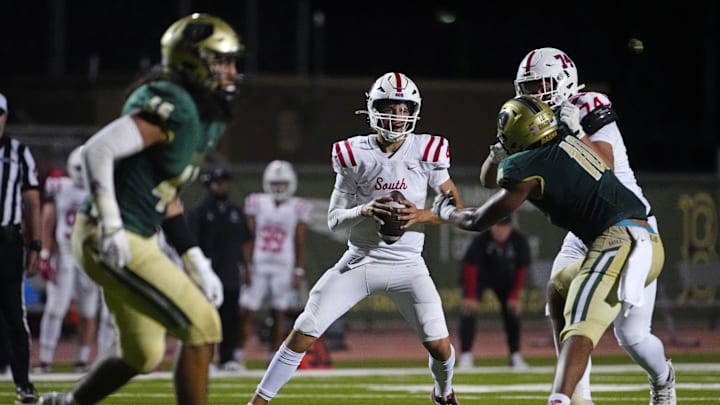 Millard South Jett Thomalla (4) looks for receivers against Basha during a game at Basha High School in Chandler on Aug. 30, 2024. Millard South Jett Thomalla (4) looks for receivers against Basha during a game at Basha High School in Chandler on Aug. 30, 2024.