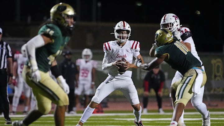 Millard South Jett Thomalla (4) looks for receivers against Basha during a game at Basha High School in Chandler on Aug. 30, 2024.