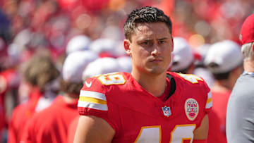 Aug 17, 2024; Kansas City, Missouri, USA; Kansas City Chiefs punter Matt Araiza (49) on the sidelines against the Detroit Lions during the game at GEHA Field at Arrowhead Stadium.