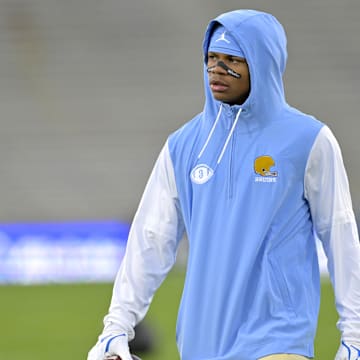 Nov 8, 2024; Pasadena, California, USA; UCLA Bruins wide receiver Kwazi Gilmer (3) warms up prior to the game against the Iowa Hawkeyes at the Rose Bowl. Mandatory Credit: Jayne Kamin-Oncea-Imagn Images