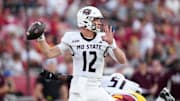 Aug 30, 2025; Los Angeles, California, USA; Missouri State Bears quarterback Jacob Clark (12) throws the ball against the Southern California Trojans in the second half at United Airlines Field at Los Angeles Memorial Coliseum. Mandatory Credit: Kirby Lee-Imagn Images