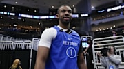 Mar 20, 2025; Milwaukee, WI, USA;  Kentucky Wildcats guard Lamont Butler (1) walks to the court during NCAA Tournament First Round Practice at Fiserv Forum. Mandatory Credit: Jeff Hanisch-Imagn Images