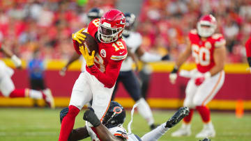 Aug 22, 2024; Kansas City, Missouri, USA; Kansas City Chiefs wide receiver Kadarius Toney (19) is tackled by Chicago Bears linebacker Amen Ogbongbemiga (45) during the first half at GEHA Field at Arrowhead Stadium. Mandatory Credit: Jay Biggerstaff-USA TODAY Sports