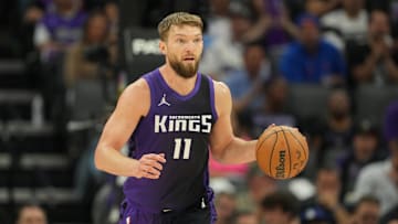 Apr 11, 2025; Sacramento, California, USA; Sacramento Kings forward Domantas Sabonis (11) dribbles against the Los Angeles Clippers during the second quarter at Golden 1 Center. Mandatory Credit: Darren Yamashita-Imagn Images
