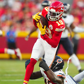 Aug 22, 2024; Kansas City, Missouri, USA; Kansas City Chiefs wide receiver Kadarius Toney (19) is tackled by Chicago Bears linebacker Amen Ogbongbemiga (45) during the first half at GEHA Field at Arrowhead Stadium. Mandatory Credit: Jay Biggerstaff-Imagn Images