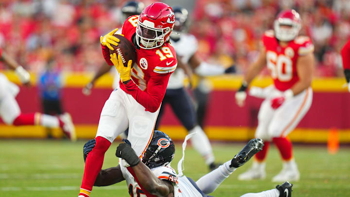 Aug 22, 2024; Kansas City, Missouri, USA; Kansas City Chiefs wide receiver Kadarius Toney (19) is tackled by Chicago Bears linebacker Amen Ogbongbemiga (45) during the first half at GEHA Field at Arrowhead Stadium. Mandatory Credit: Jay Biggerstaff-Imagn Images