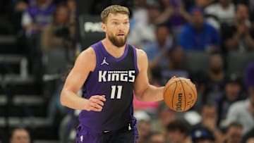 Apr 11, 2025; Sacramento, California, USA; Sacramento Kings forward Domantas Sabonis (11) dribbles against the Los Angeles Clippers during the second quarter at Golden 1 Center. Mandatory Credit: Darren Yamashita-Imagn Images