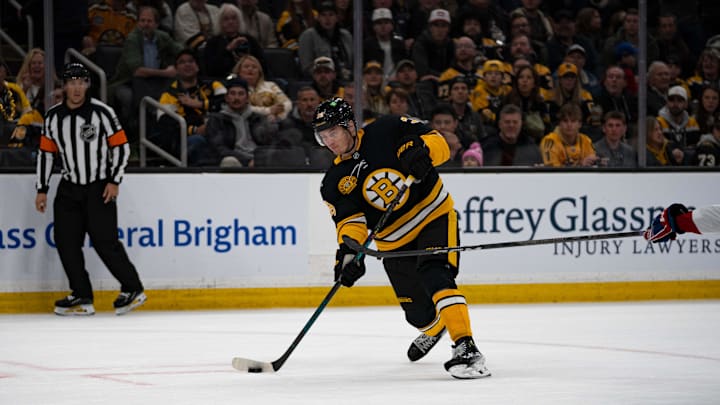 Dec 1, 2024; Boston, Massachusetts, USA; Boston Bruins center Morgan Geekie (39) shoots in the third period of a game against the Montreal Canadiens at TD Garden. Mandatory Credit: Natalie Reid-Imagn Images