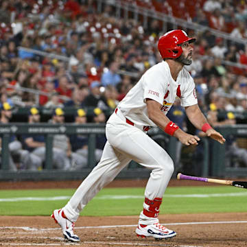 Aug 20, 2024; St. Louis, Missouri, USA;  St. Louis Cardinals pinch hitter Matt Carpenter (13) hits a two run home run against the Milwaukee Brewers during the eighth inning at Busch Stadium. Mandatory Credit: Jeff Curry-Imagn Images