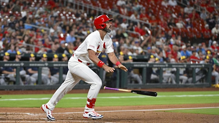 Aug 20, 2024; St. Louis, Missouri, USA;  St. Louis Cardinals pinch hitter Matt Carpenter (13) hits a two run home run against the Milwaukee Brewers during the eighth inning at Busch Stadium. Mandatory Credit: Jeff Curry-Imagn Images