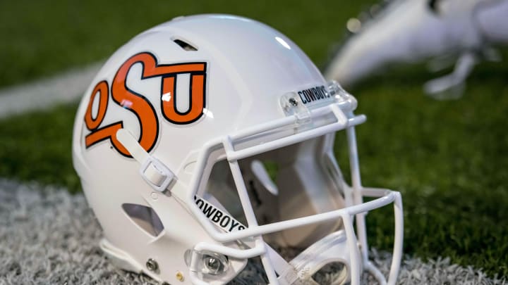 Oct 27, 2018; Stillwater, OK, USA; Oklahoma State Cowboys helmet rest on the field before the game against the Texas Longhorns at Boone Pickens Stadium. Mandatory Credit: Rob Ferguson-USA TODAY Sports