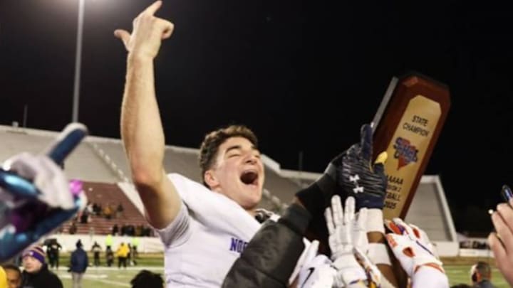 Northwestern quarterback Finley Polk celebrates after passing for 427 yards and 4 TDs in his team's state championship victory.