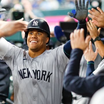 Sep 4, 2024; Arlington, Texas, USA; New York Yankees outfielder Juan Soto (22) celebrates with teammates after hitting a two run home run during the fifth inning against the Texas Rangers at Globe Life Field.