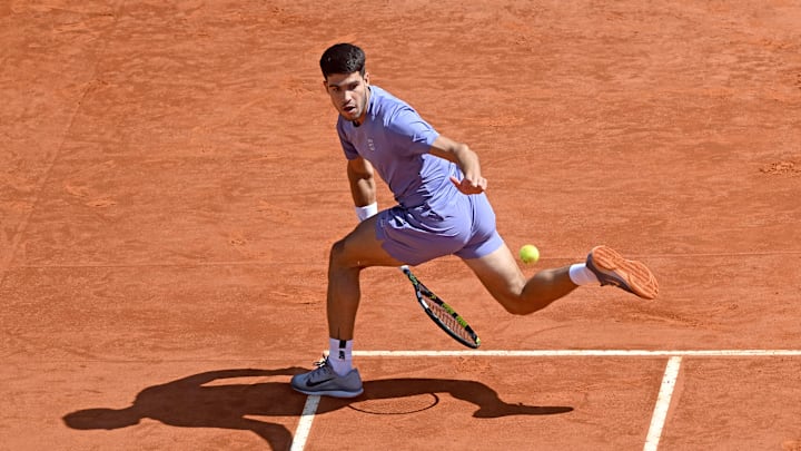 Carlos Alcaraz hits a tweener shot against Daniel Altmaier in the Monte-Carlo Masters. Carlos Alcaraz hits a tweener shot against Daniel Altmaier in the Monte-Carlo Masters.
