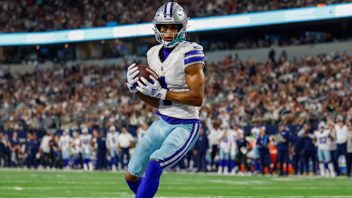 Sep 22, 2024; Arlington, Texas, USA; Dallas Cowboys wide receiver Jalen Tolbert (1) catches a touchdown pass during the fourth quarter against the Baltimore Ravens at AT&T Stadium. Mandatory Credit: Andrew Dieb-Imagn Images