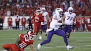 Nov 22, 2025; Houston, Texas, USA; TCU Horned Frogs quarterback Josh Hoover (10) runs with the ball during the fourth quarter against the Houston Cougars at TDECU Stadium. Mandatory Credit: Troy Taormina-Imagn Images