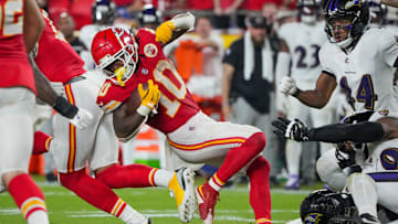 Sep 5, 2024; Kansas City, Missouri, USA; Kansas City Chiefs running back Isiah Pacheco (10) runs the ball against the Baltimore Ravens during the second half at GEHA Field at Arrowhead Stadium. Mandatory Credit: Denny Medley-Imagn Images