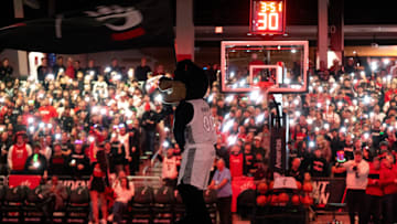 Cincinnati Bearcats mascot waives a flag in before the NCAA basketball game between the Cincinnati Bearcats and Arizona State Sun Devils at the Fifth Third Arena in Cincinnati on Saturday, January 18, 2025.
