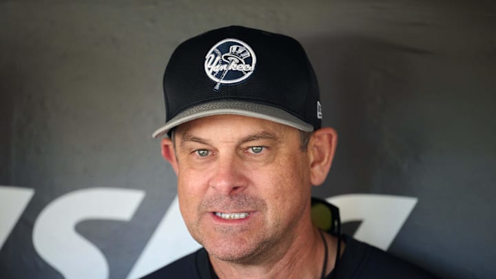 Jun 1, 2024; San Francisco, California, USA; New York Yankees manager Aaron Boone (17) reacts to a reporter's question while talking to the media before the game between the San Francisco Giants and the New York Yankees at Oracle Park. Mandatory Credit: Robert Edwards-Imagn Images