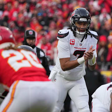Jan 18, 2025; Kansas City, Missouri, USA; Houston Texans quarterback C.J. Stroud (7) waits for the snap against the Kansas City Chiefs during the first quarter of a 2025 AFC divisional round game at GEHA Field at Arrowhead Stadium. Mandatory Credit: Denny Medley-Imagn Images