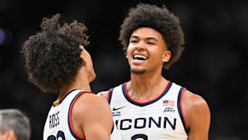 UConn Huskies forward Jayden Ross (23) and forward Jaylin Stewart (3) 