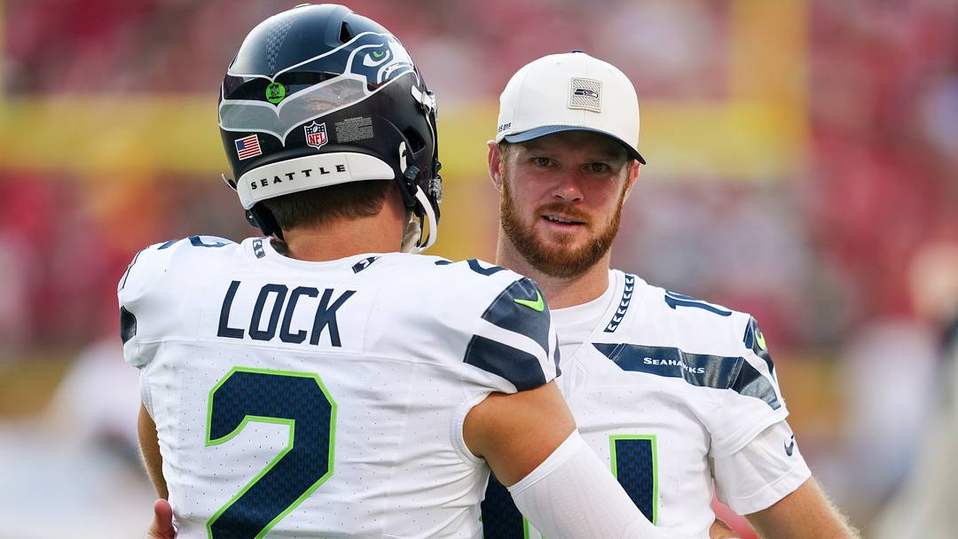 Aug 28, 2026; Kansas City, Missouri, USA; Seattle Seahawks quarterback Sam Darnold (14) talks with quarterback Drew Lock (2) prior to a game against the Kansas City Chiefs at Arrowhead Stadium. Mandatory Credit: Jay Biggerstaff-Imagn Images
