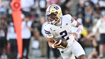 Sep 20, 2025; Pullman, Washington, USA; Washington Huskies quarterback Demond Williams Jr. (2) scrambles against the Washington State Cougars in the first half of Apple Cup at Gesa Field at Martin Stadium. Mandatory Credit: James Snook-Imagn Images