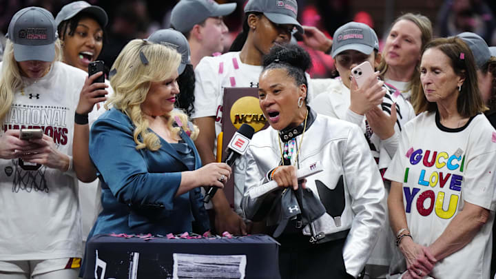 Apr 7, 2024; Cleveland, OH, USA; South Carolina Gamecocks head coach Dawn Staley celebrates after defeating the Iowa Hawkeyes in the finals of the Final Four of the womens 2024 NCAA Tournament at Rocket Mortgage FieldHouse. Mandatory Credit: Kirby Lee-Imagn Images