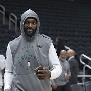 Apr 8, 2025; Milwaukee, Wisconsin, USA; Milwaukee Bucks forward Bobby Portis (9) walks onto the court for the first time before a game since his 25 game suspension as the Milwaukee Bucks get ready to play the Minnesota Timberwolves at Fiserv Forum. Mandatory Credit: Michael McLoone-Imagn Images